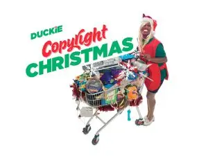 Copyright Christmas logo featuring performer Harold Offeh in drag as a shop floor santa helper. She is wearing a red tabard, green workdress and is pushing a supermarket trolley full of swag.